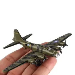 Model of the Boeing B-17 Flying Fortress aircraft in hand.